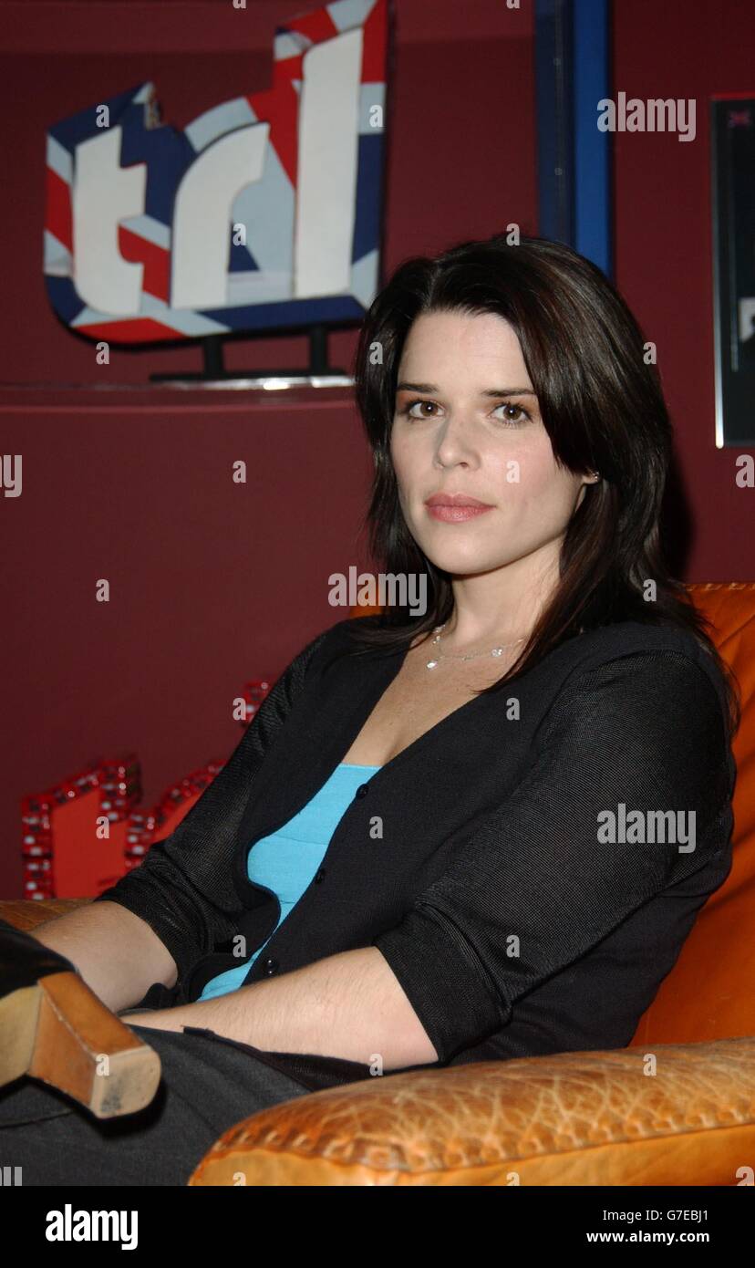 Celebrity television actor sitting neve campbell hi-res stock