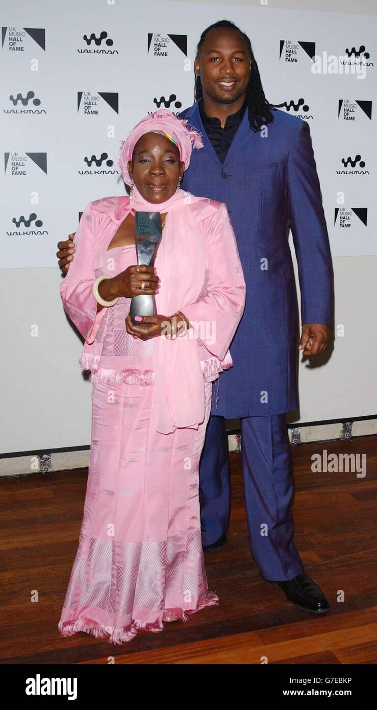 Lennox Lewis and Rita Marley, who accepted an Award on behalf of her late husband Bob Marley at the UK Music Hall Of Fame - live final, at the Hackney Empire in east London. The Channel 4 series looking at popular music from the 1950s to the 1980s, has been asking the public to vote on who should enter the Hall Of Fame, and winners are inducted this evening. Stock Photo