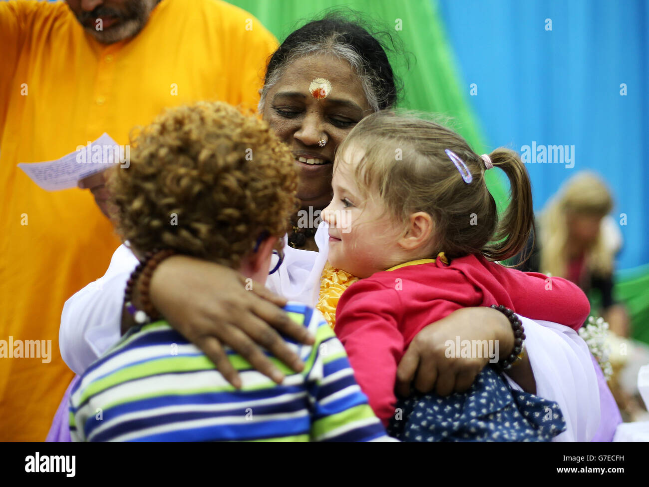 Mata Amritanandmayi (Amma) with Albie Lally, six, and his sister Clara