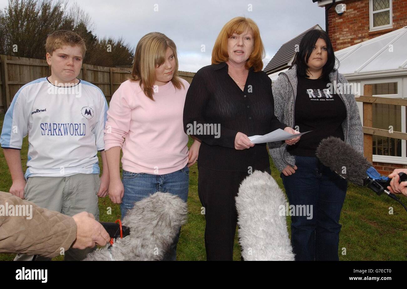 Widow Deborah Martin, wife of train driver Stan Martin, talks with the media in Torquay, Devon as she stands with children James aged 15. Louise 13 and Sian 21 (extreme right - who is Stan's daughter from an earlier marriage). Stan Martin was killed in last week's train accident at Ufton Nervet, Berkshire, when the 1735 London to Plymouth train hit a car on a level crossing. Stock Photo
