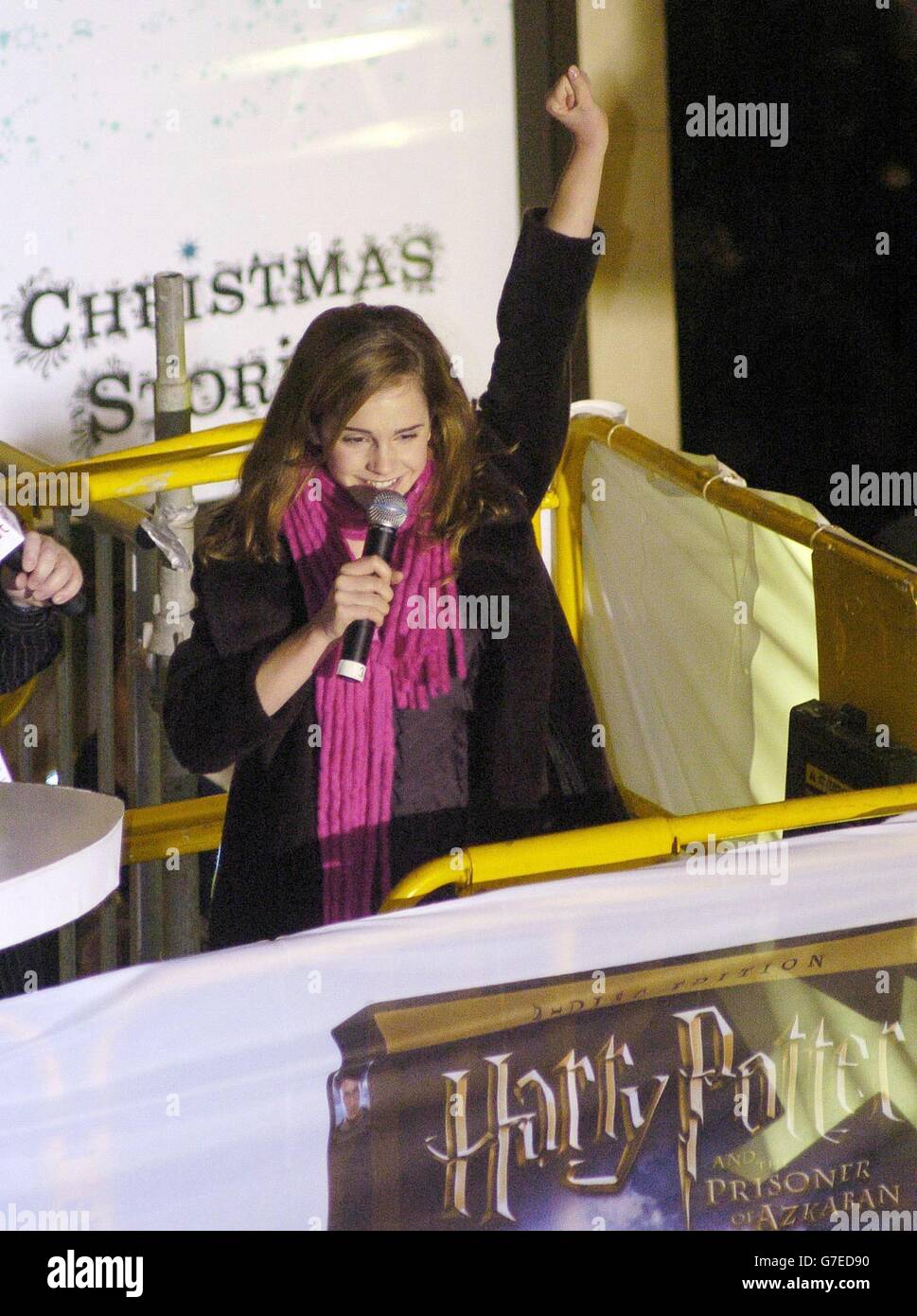 Teenage actress Emma Watson, who plays Hermione Grainger in the Harry Potter films, waves to the crowd in London's Oxford Street before helping to turn on the traditional Christmas lights. Stock Photo