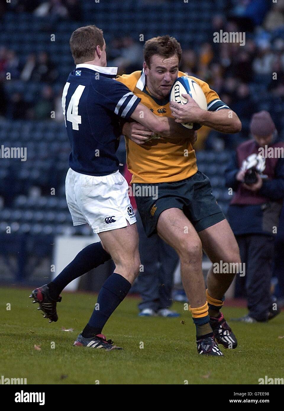 Scotland's Chris Paterson tackles Australian Full Back Chris Latham during the International Match at Murrayfield. Stock Photo