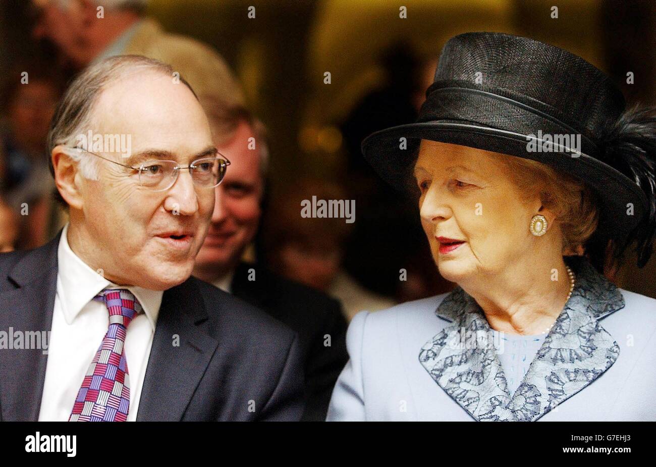 Baroness Thatcher chats to the current Conservative Party leader, Michael Howard, before a ceremony to mark the nstallation of the memorial gates at St Paul's Cathedral dedicated to Sir Winston Churchill in the cathedral's crypt, in central London. Stock Photo
