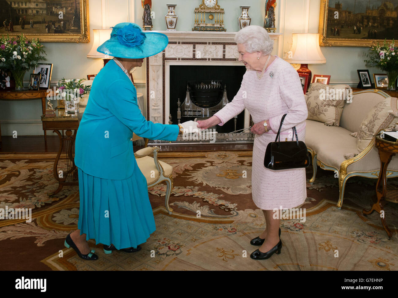 Queen Elizabeth II holds an audience with Dame Marguerite Pindling upon ...