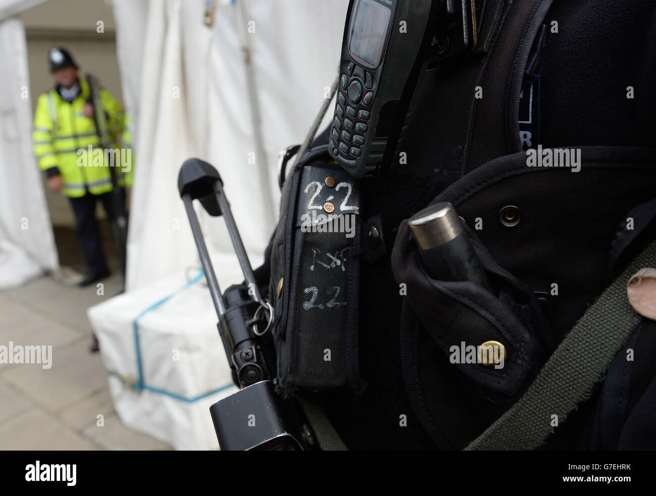 An armed Metropolitan police officer outside the Houses of Parliament ...