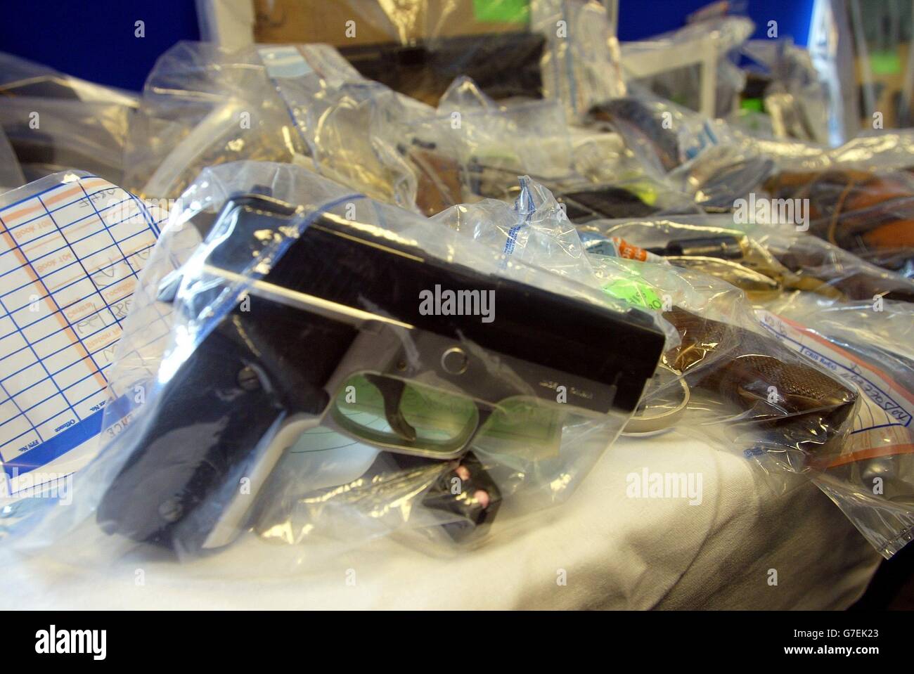 Guns from a collection of firearms seized in raids across London are ...