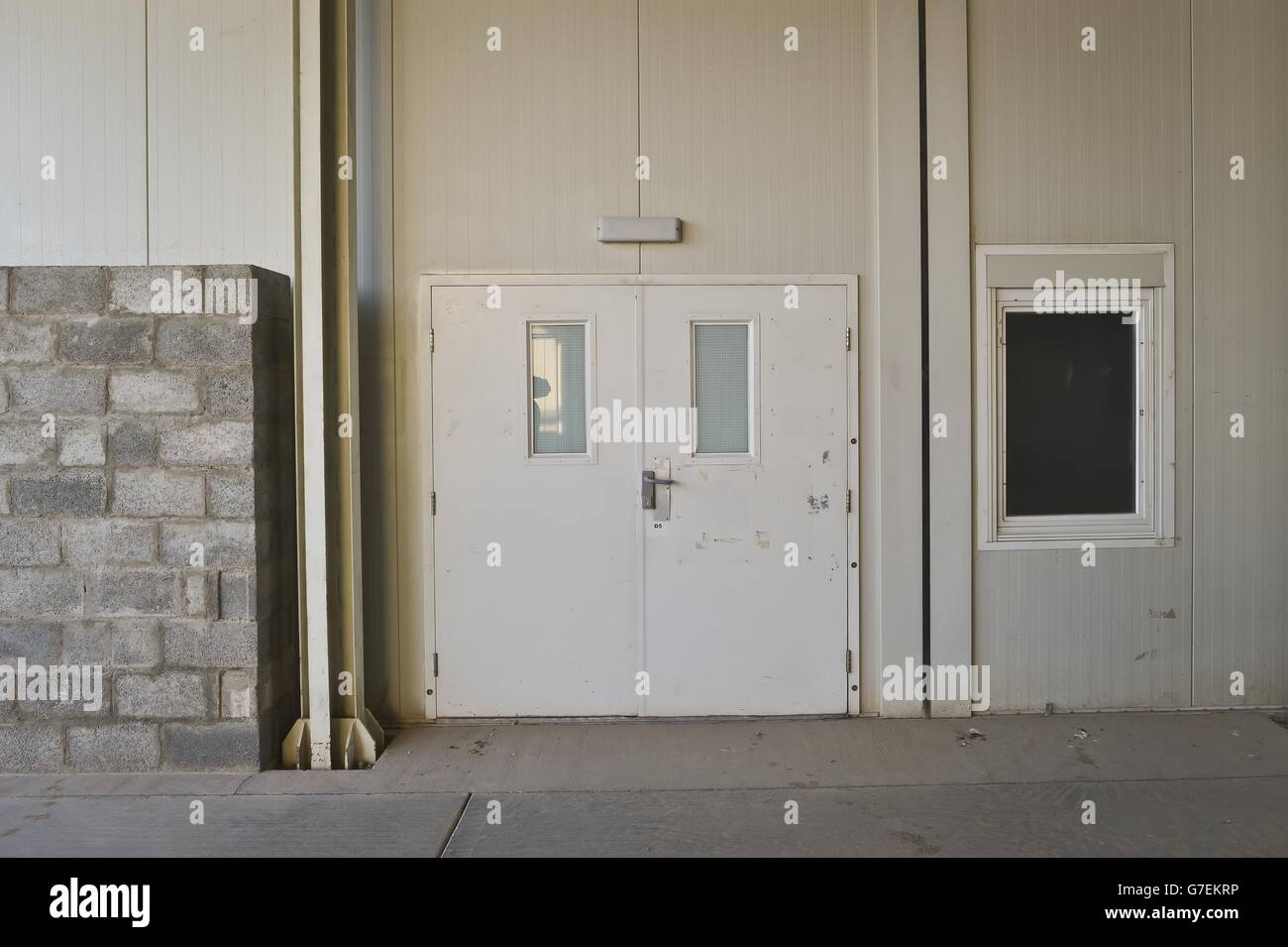 The emergency trauma entrance at the field hospital in Camp Bastion, Afghanistan, is locked shut leaving it looking like a ghost town, where once there were around 40,000 coalition soldiers operating from the base at the height of the conflict. Stock Photo