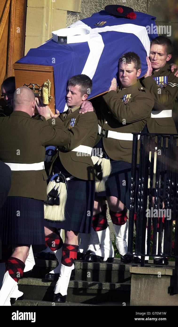 Fellow servicemen carry the coffin of Private Kevin McHale from St Patrick's Roman Catholic Church in Lochgelly. He was the first Black Watch soldier to be killed after the regiment's recent move to central Iraq and died when his Warrior armoured car overturned during the redeployment north on October 29. Stock Photo
