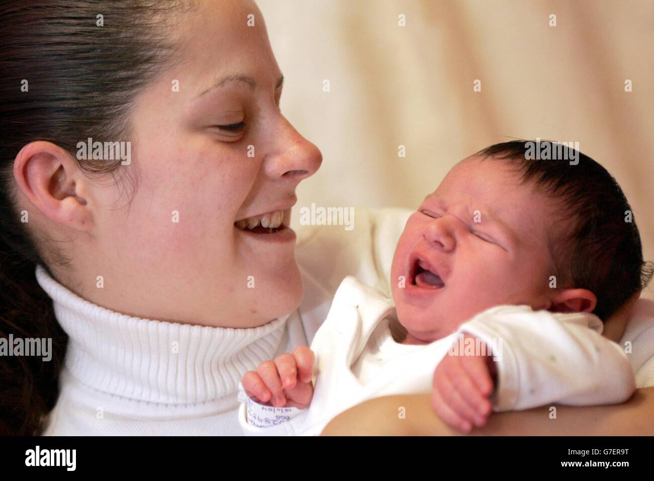 Soldiers wife gives birth Stock Photo