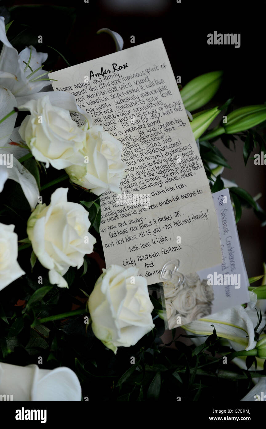 Flowers and a message left by Carlos Santana and Cindy Blackman Santana following the funeral of Jack Bruce at Golders Green Crematorium, north west London. Stock Photo