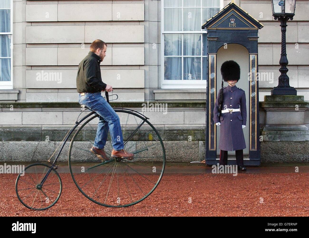 A penny farthing ridden by Tim Gun arrives at Buckingham Palace in London, where it will join other design classics including a mini and the nose cone from a concorde in the quadrangle of the Queen's official residence for an exhibition showcasing British excellence entitled the 'Avenue of Design' and will be hosted by the Queen this evening. Stock Photo