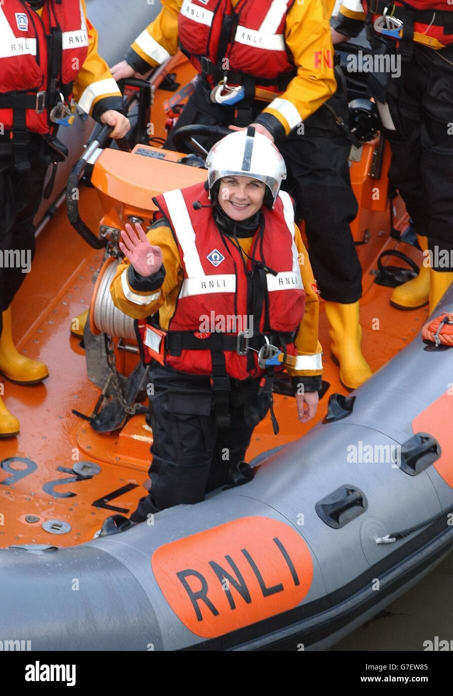 RNLI Lifeboat woman Aileen Jones on board a lifeboat at Porthcawl, South Wales, who is to become the first female in 116 years to receive a bravery award. Aileen, helmsman of the RNLI's Porthcawl lifeboat led a team who braved gale force winds and rough sees in August to save a skipper and injured fisherman. Stock Photo
