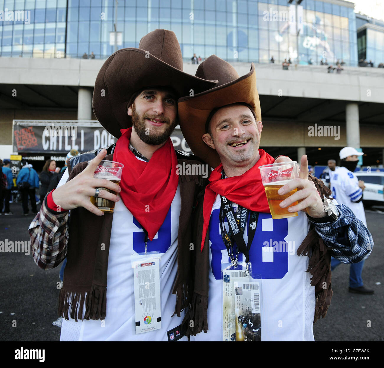 Two Dallas Cowboys fans show their support outside the stadium before