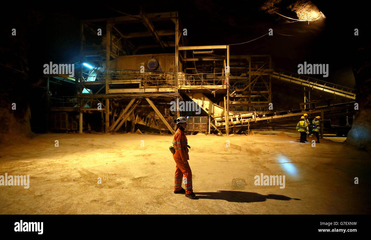 Miners work at the salt face, 500ft below the surface at the Compass