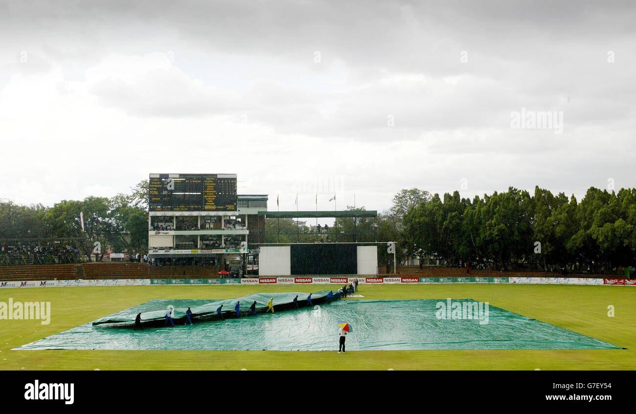 Sport cricket weather rain covers shot from above hires stock
