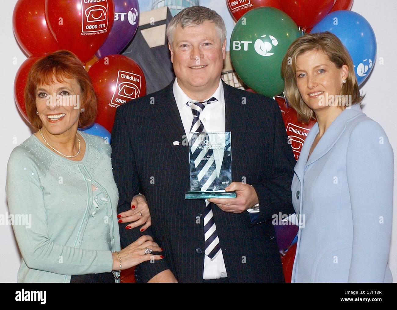 A man who dedicated his time to helping a gang of youths he found trying to break into his car was honoured for his work. Melrose Diack from Clitheroe in Lancashire receives an award from Esther Rantzen and The Countess of Wessex at the annual Childline Awards in London where he was honoured for his services to children. Stock Photo