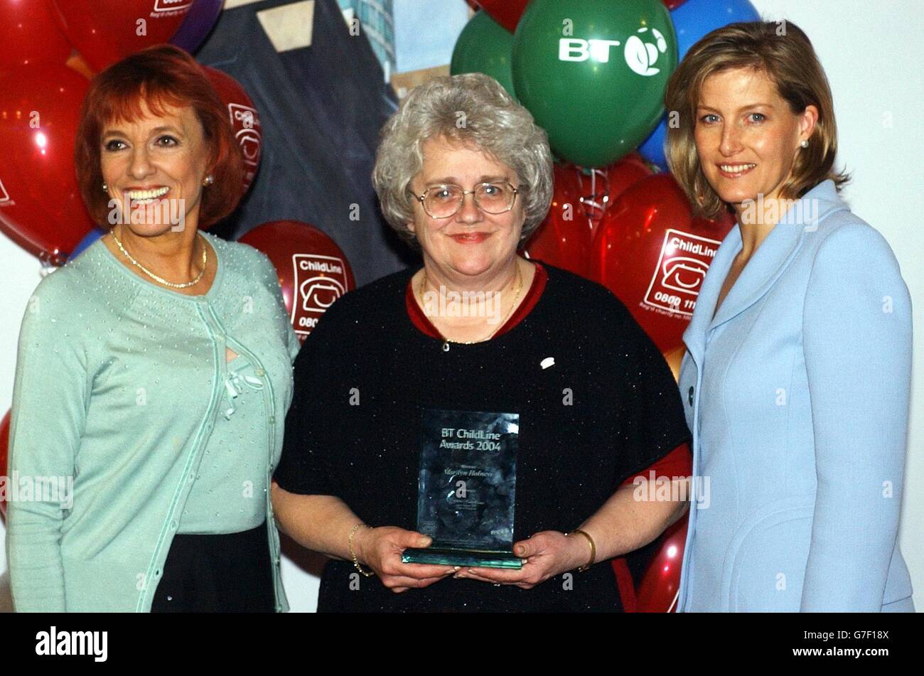 Marilyn Holness from Kent receives an award from Esther Rantzen and The Countess of Wessex at the annual Childline Awards in London where she was honoured for her services to children. Stock Photo