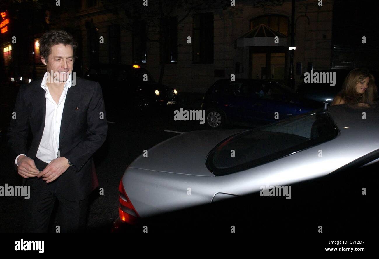 Hugh Grant and Jemima Goldsmith leave a CNN/Time Warner American election night party at the National Portrait Gallery in central London. Stock Photo