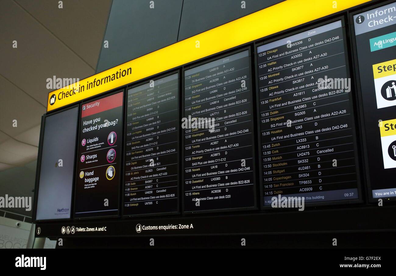 the-departures-board-in-terminal-2-at-heathrow-airport-showing-some-the