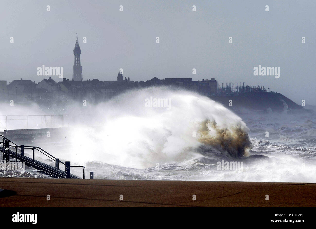 Large waves hit the seafront at Blackpool, with the famous Blackpool Tower, as the remnants of Hurricane Gonzalo blew into Britain, causing rush-hour travel misery for road, rail and air travellers. Stock Photo