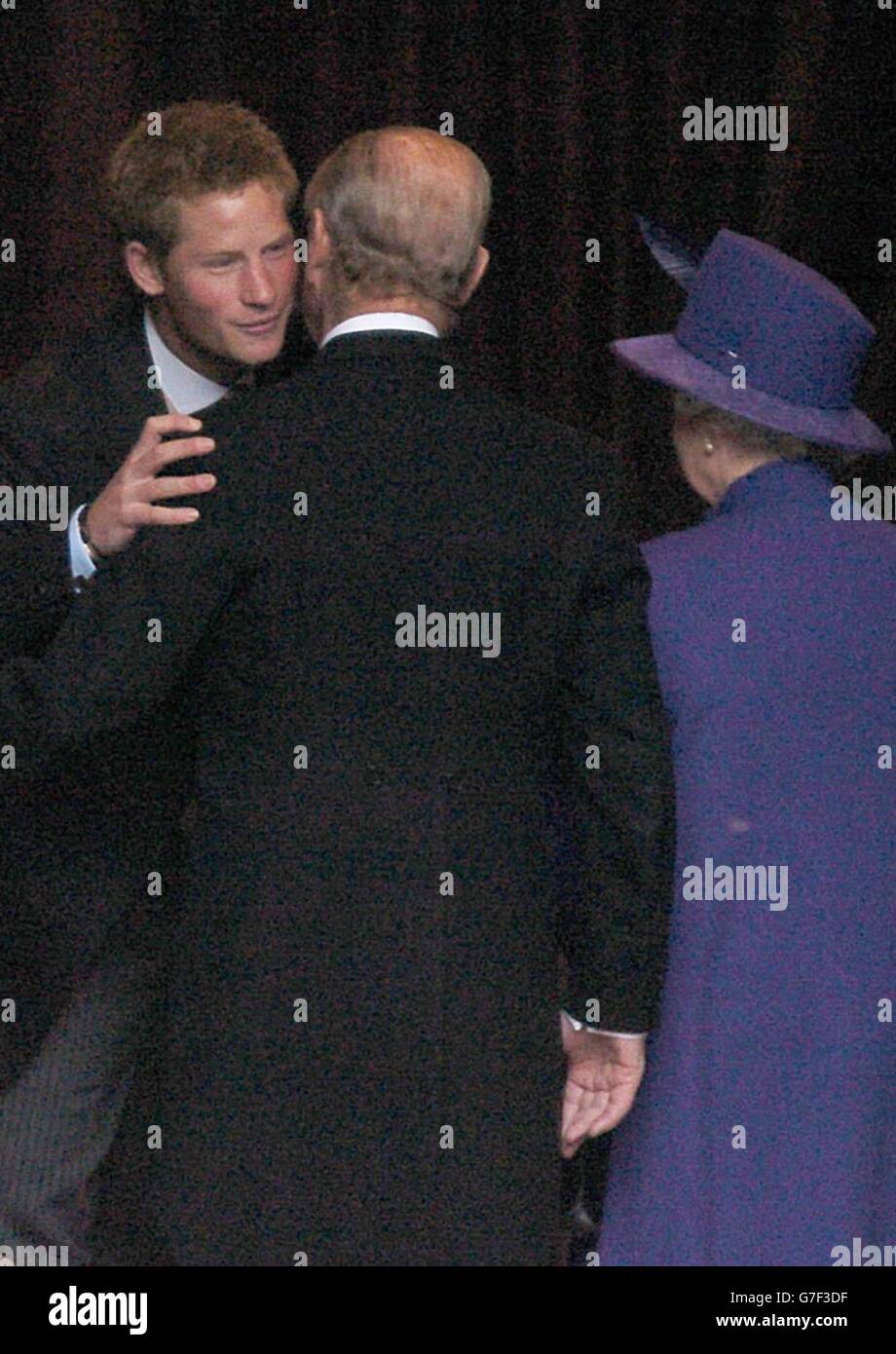 Prince Harry (left) greets his grandparents, the Queen and the Duke of Edinburgh at the wedding of Lady Tamara Grosvenor to Edward van Cutsem at Chester Cathedral. Prince William will act as usher at the lavish service attended by 650 guests, including the Queen and the Duke of Edinburgh. The wedding brings together two of Britain's wealthiest families. Lady Tamara Grosvenor, 24, is the eldest daughter of the Duke of Westminster, Britain's richest man, whose land holdings, including swathes of Mayfair and Belgravia, give him a personal fortune estimated at 4 billion. Stock Photo