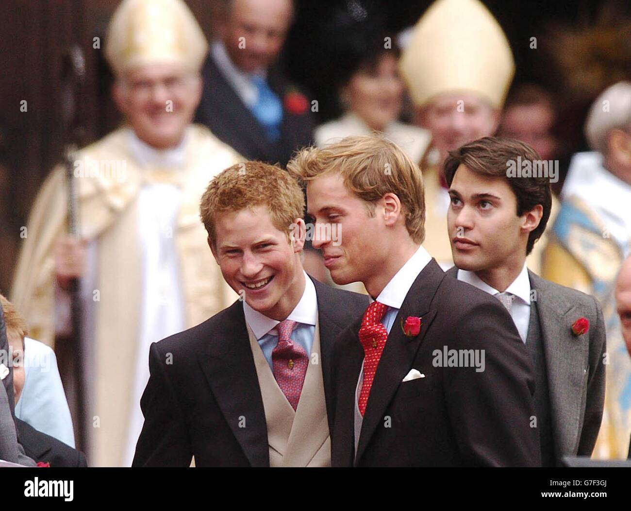 Prince William, Prince Harry and (r) William Van Cutsem as they leave the wedding of Lady Tamara Grosvenor to Edward van Cutsem at Chester Cathedral. Prince William acted as usher at the lavish service attended by 650 guests, including the Queen and the Duke of Edinburgh. The wedding brings together two of Britain's wealthiest families. Lady Tamara Grosvenor, 24, is the eldest daughter of the Duke of Westminster, Britain's richest man, whose land holdings, including swathes of Mayfair and Belgravia, give him a personal fortune estimated at 4 billion. Stock Photo