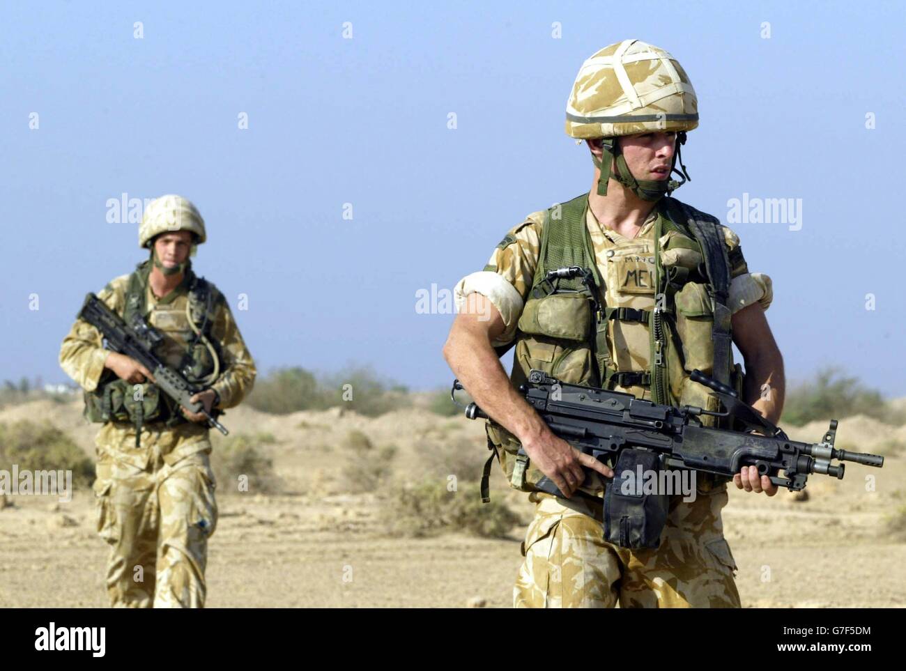 OVERSEAS USE ONLY: Soldiers from the Black Watch Battle group, cover ground near their foward operating base "Springfield" on the east bank of the Euphrates river, 25 miles south of Baghdad. A Black Watch soldier was injured today in a mortar attack on the Camp Dogwood base, the Ministry of Defence confirmed today. The MoD said the injuries were not thought to be life-threatening. "A mortar landed inside the compound earlier today, injuring a soldier," said a spokesman. "We do not believe the soldier has life-threatening injuries." Stock Photo