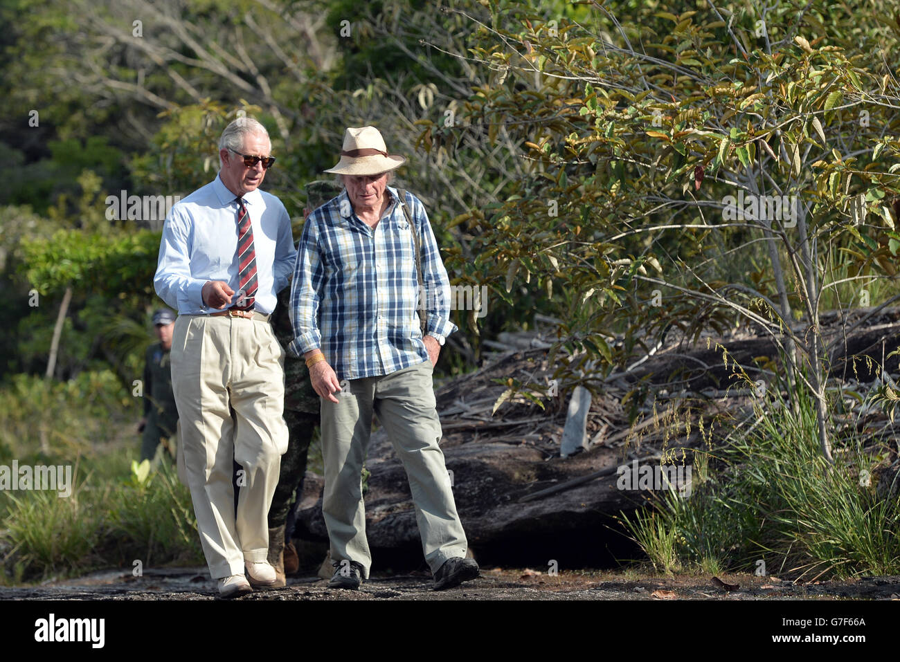 The Prince of Wales and Martin Von-Hildebrand have a walking tour of Cano Cristales, La Macarena in Colombia, on the third day of the Prince of Wales and Duchess of Cornwall's tour to Colombia and Mexico. Stock Photo