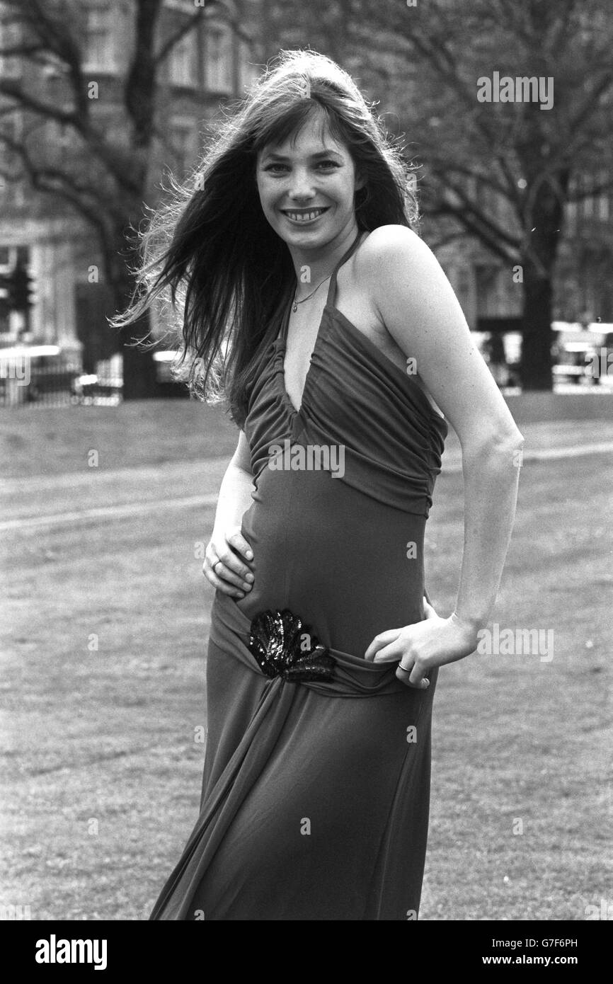 Actress and singer Jane Birkin models a long, draped dress with the slinky  look in London. It is in red jersey and comes from the Tsaritsar autumn  collection Stock Photo - Alamy