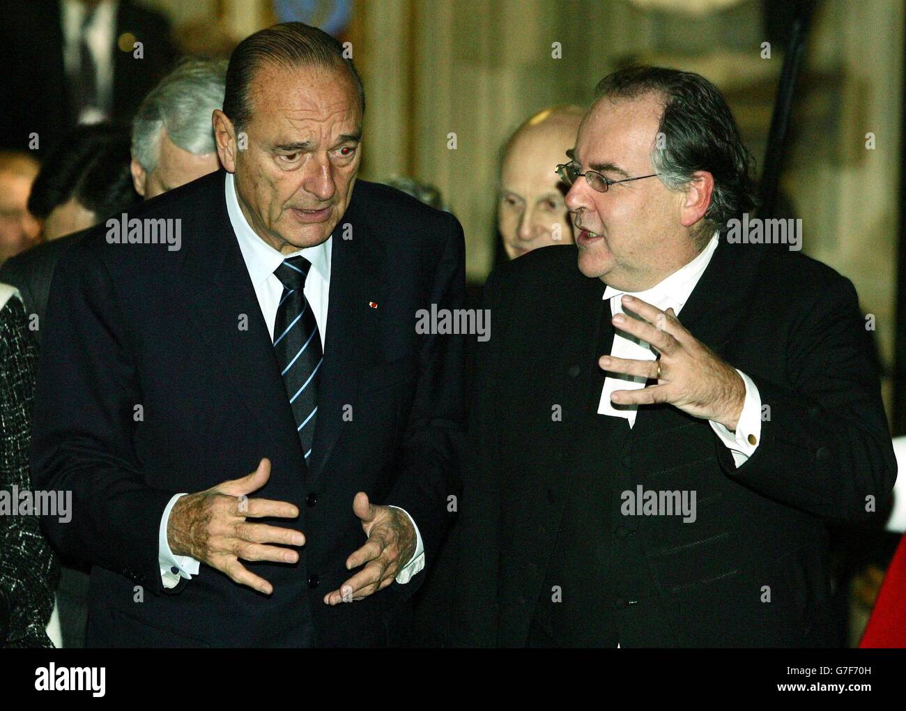 French President Jacques Chirac talks with the Lord Chancellor Lord Falconer (right) as he visits the Palace of Westminster during his state visit to London, Thursday November 18, 2004. See PA Story POLITICS Blair. PA Photo Stephen Hird/Reuters/Pool Stock Photo