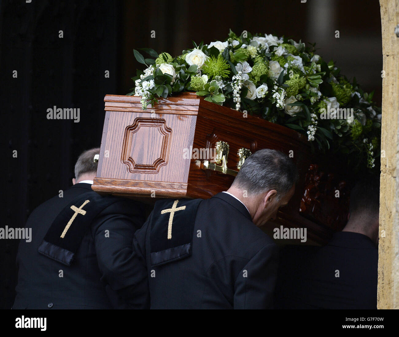 The coffin of Lynda Bellingham is carried into St Bartholomew's Church ...