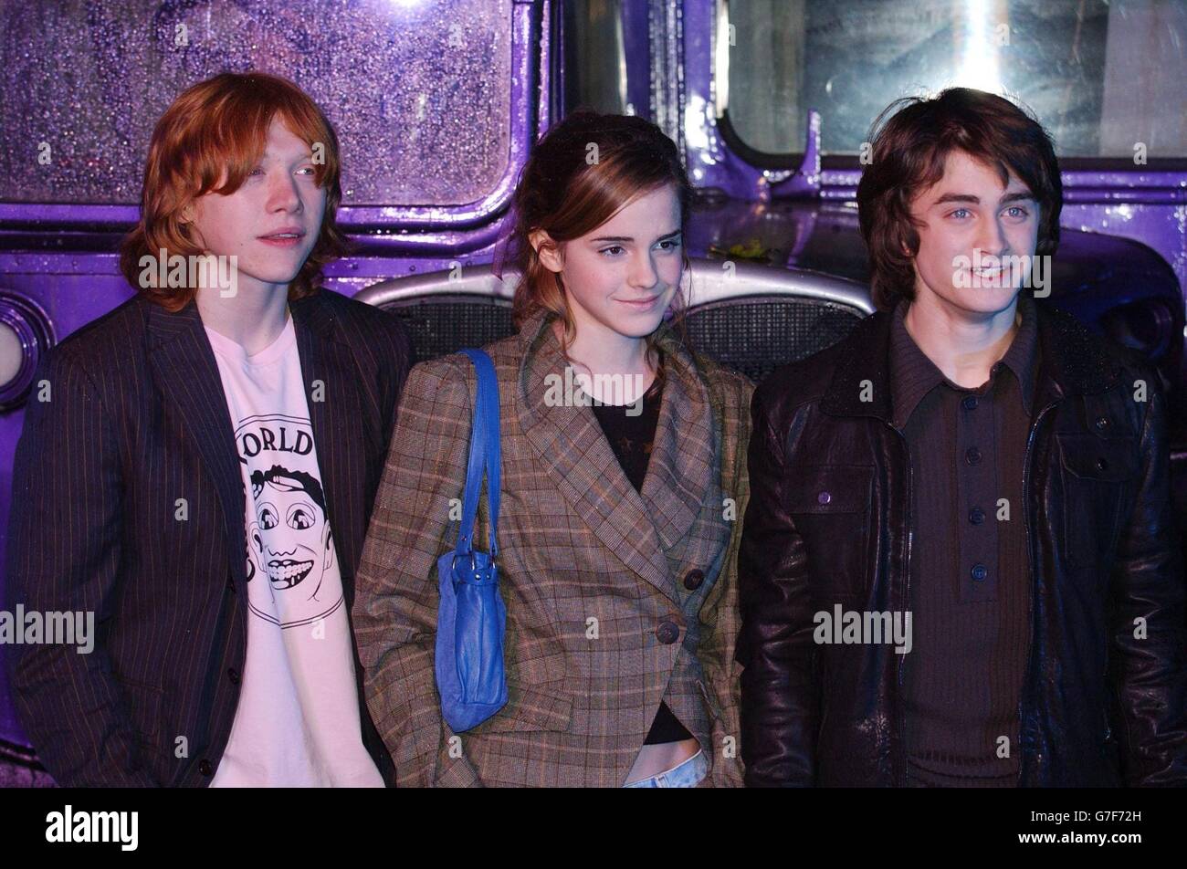 (From left to right) Rupert Grint (Ron), Emma Watson (Hermione), and Daniel Radcliffe (Harry) arrive for the Global DVD & VHS Launch party of Harry Potter And The Prisoner Of Azkaban, at Middle Temple in central London Stock Photo