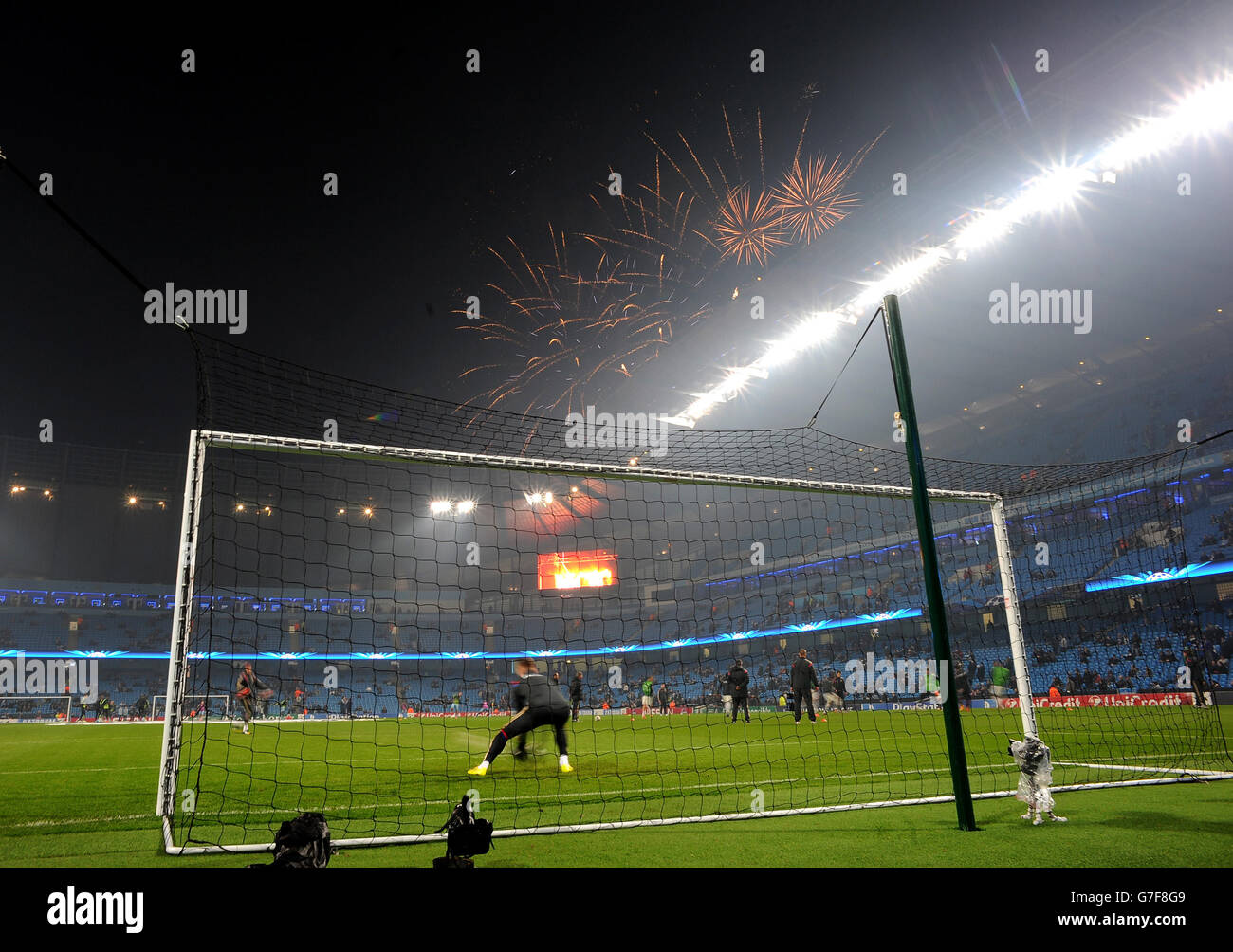 Fireworks are set off above the Etihad Stadium to mark Guy Fawkes Day during the warm up before the UEFA Champions League Group E match at the Etihad Stadium, Manchester. PRESS ASSOCIATION Photo. Picture date: Wednesday November 5, 2014. See PA story SOCCER Man City. Photo credit should read: Martin Rickett/PA Wire Stock Photo