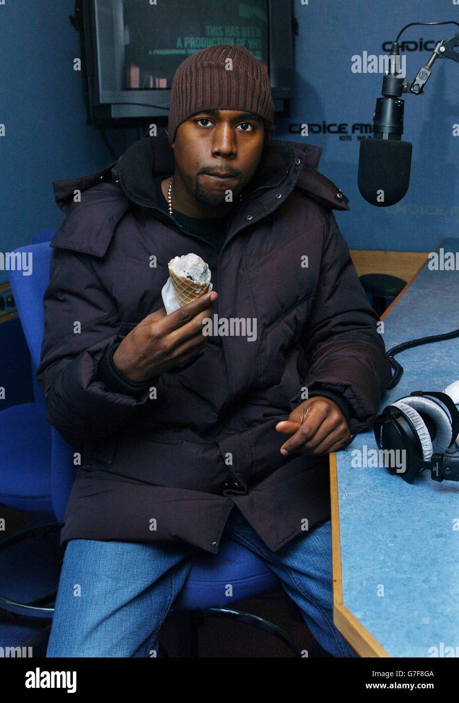 Hip-hop artist Kanye West poses for photographs before his live radio  interview with DJ Jigs on Choice FM, at their new studios in the Capital  Radio building, Leicester Square, central London Stock