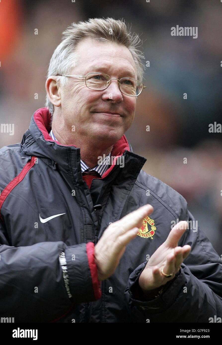PA library file dated 20/11/2004 of Manchester United manager Sir Alex Ferguson who is, Tuesday November 23, 2004, is hoping to celebrate his 1,000th game as Red Devils boss by watching his side gain the victory against Lyon that would ease them into the Champions League knock-out phase with a game to spare. See PA story SOCCER Man Utd Ferguson. PA Photo: Stock Photo