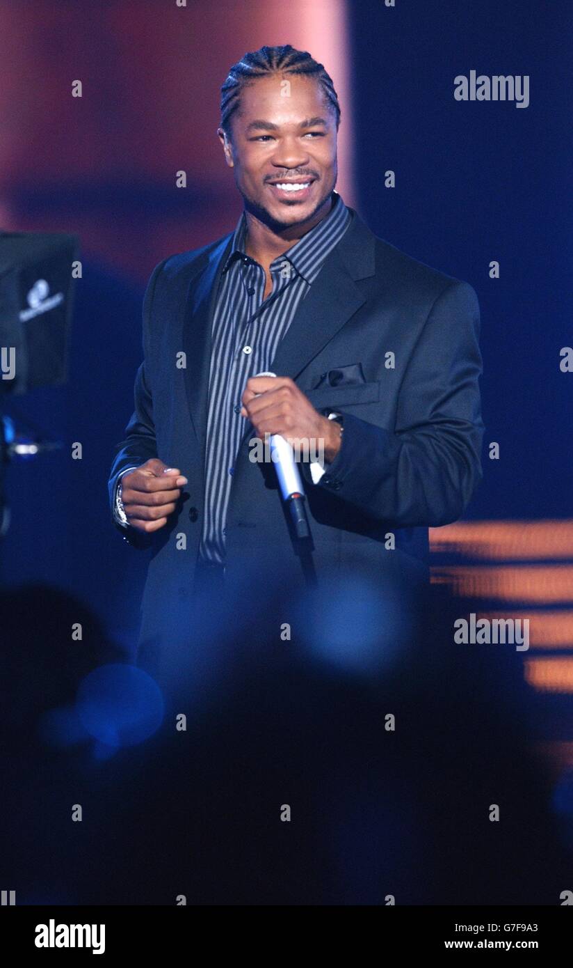 Celebrity music on stage performing 1 2 half length xzibit hi