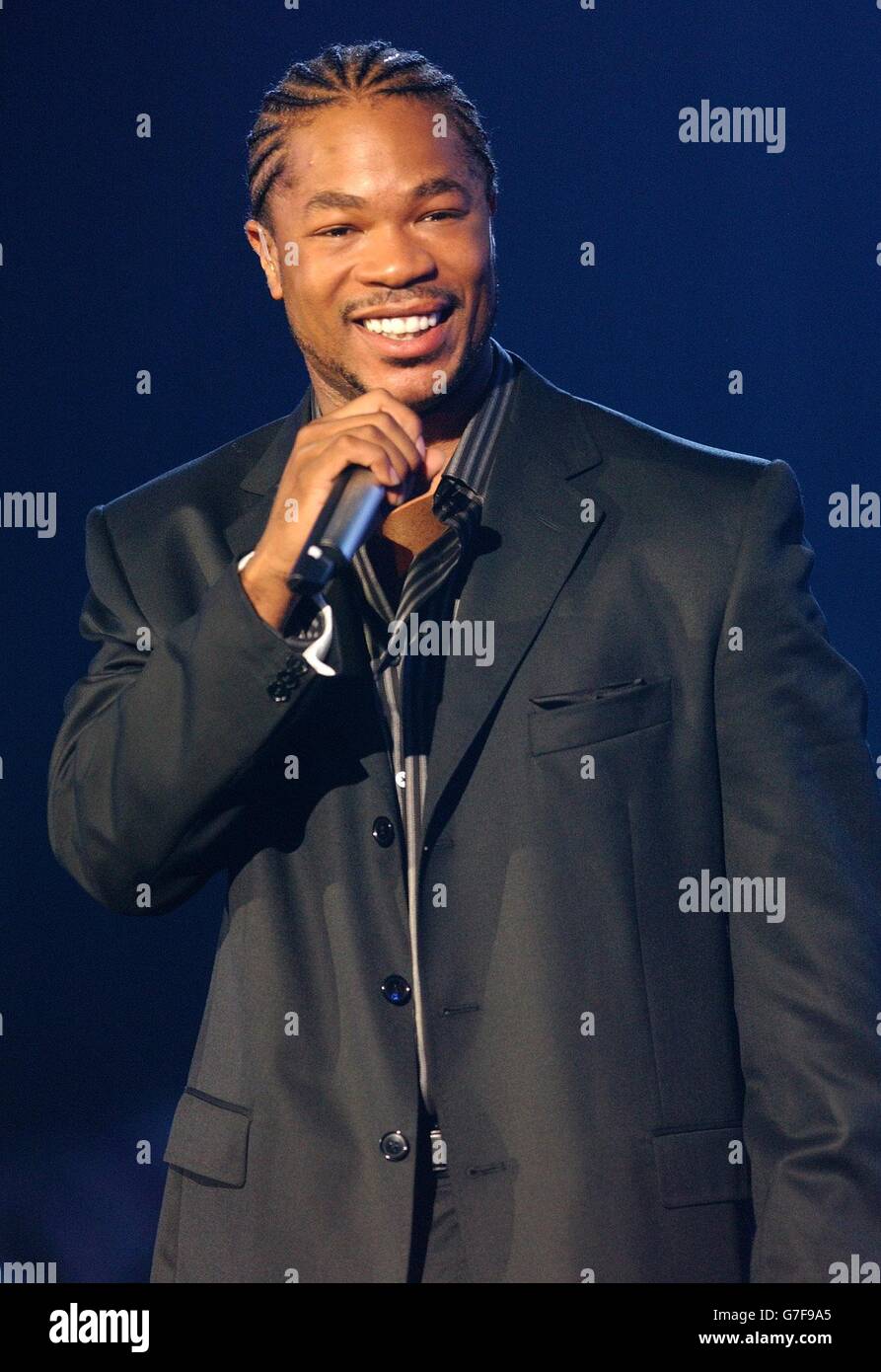 Celebrity music on stage performing 1 2 half length xzibit hi