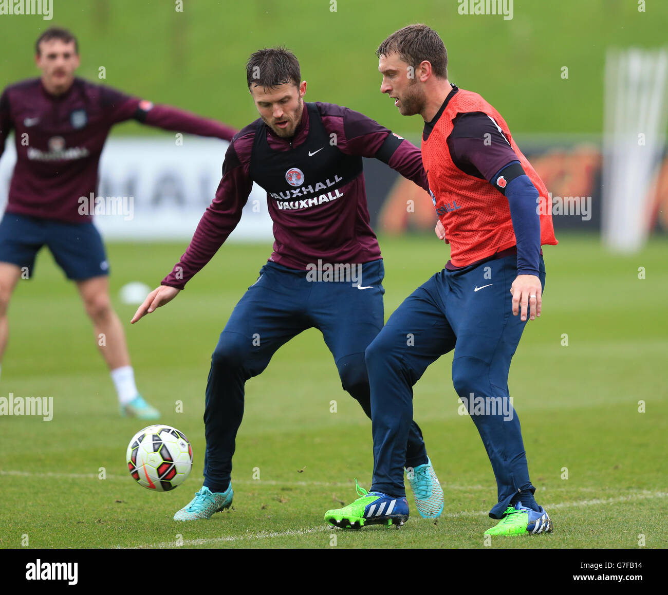 Soccer - UEFA Euro 2016 - Qualifying - Group E - England v Slovenia - England Training and Press Conference - St George's Park. Michael Carrick (left) and Rickie Lambert during a training session at St George's Park, Burton Upon Trent. Stock Photo