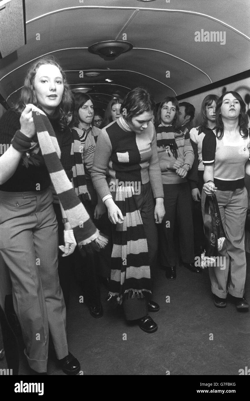 Burnley supporters dancing in the Kick-Off Disco, one of the coaches of the League Liner, the Football League's luxury train for soccer fans, as it made its first run from Burnley to London. The train, on its first charter, was bringing Burnley fans south for the match against Queen's Park Rangers. Stock Photo