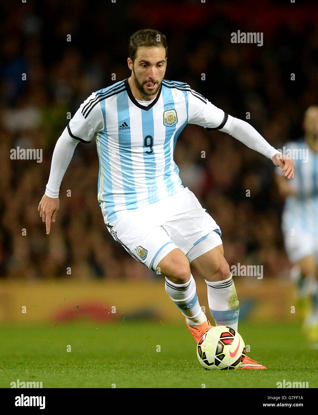 Argentina's Gonzalo Higuain during the International Friendly match at Old Trafford, Manchester. PRESS ASSOCIATION Photo. Picture date: Tuesday November 18, 2014. See PA Story SOCCER Argentina. Photo credit should read: Martin Rickett/PA Wire. Stock Photo