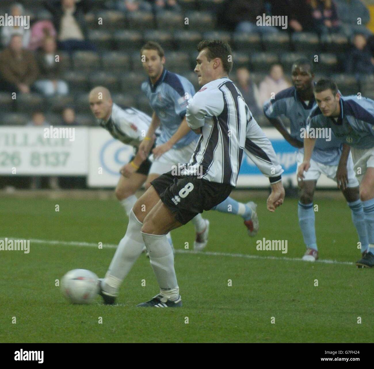 Notts County's Julien Baudet scores from the penalty spot to put County 1-0 up against Woking in the FA Cup First Round match at Meadow Lane, Nottingham, Saturday November 13, 2004. NO UNOFFICIAL CLUB WEBSITE USE. Stock Photo