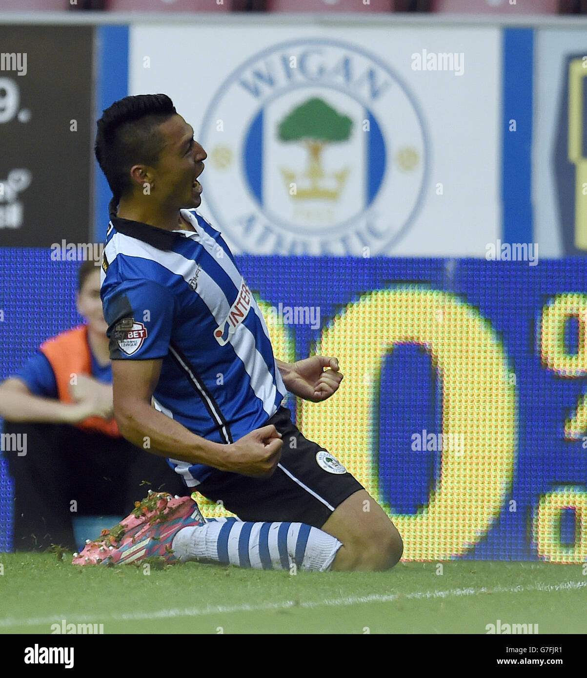 Wigan Athletic's Roger Espinoza celebrates scoring the second goal of the game for his side during the Sky Bet Championship match at the DW Stadium, Wigan. Stock Photo