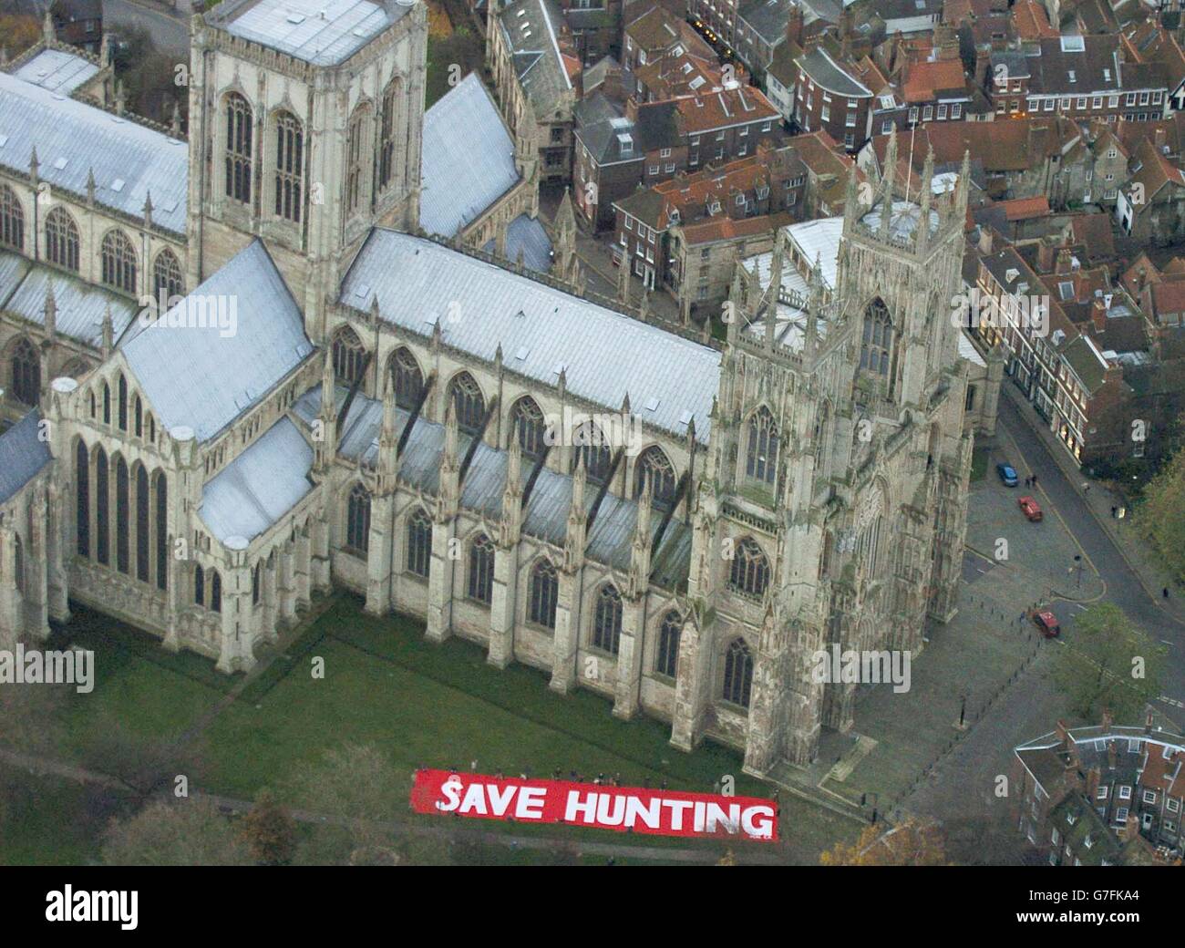 Hunt supporters place a banner in the gardens of York Minster after MPs backed an outright ban Tuesday evening. If peers reject the ban then the Government is expected to use the Parliament Act to force it through. A compromise to allow foxhunting under licence was overwhelmingly rejected in the Commons. Stock Photo