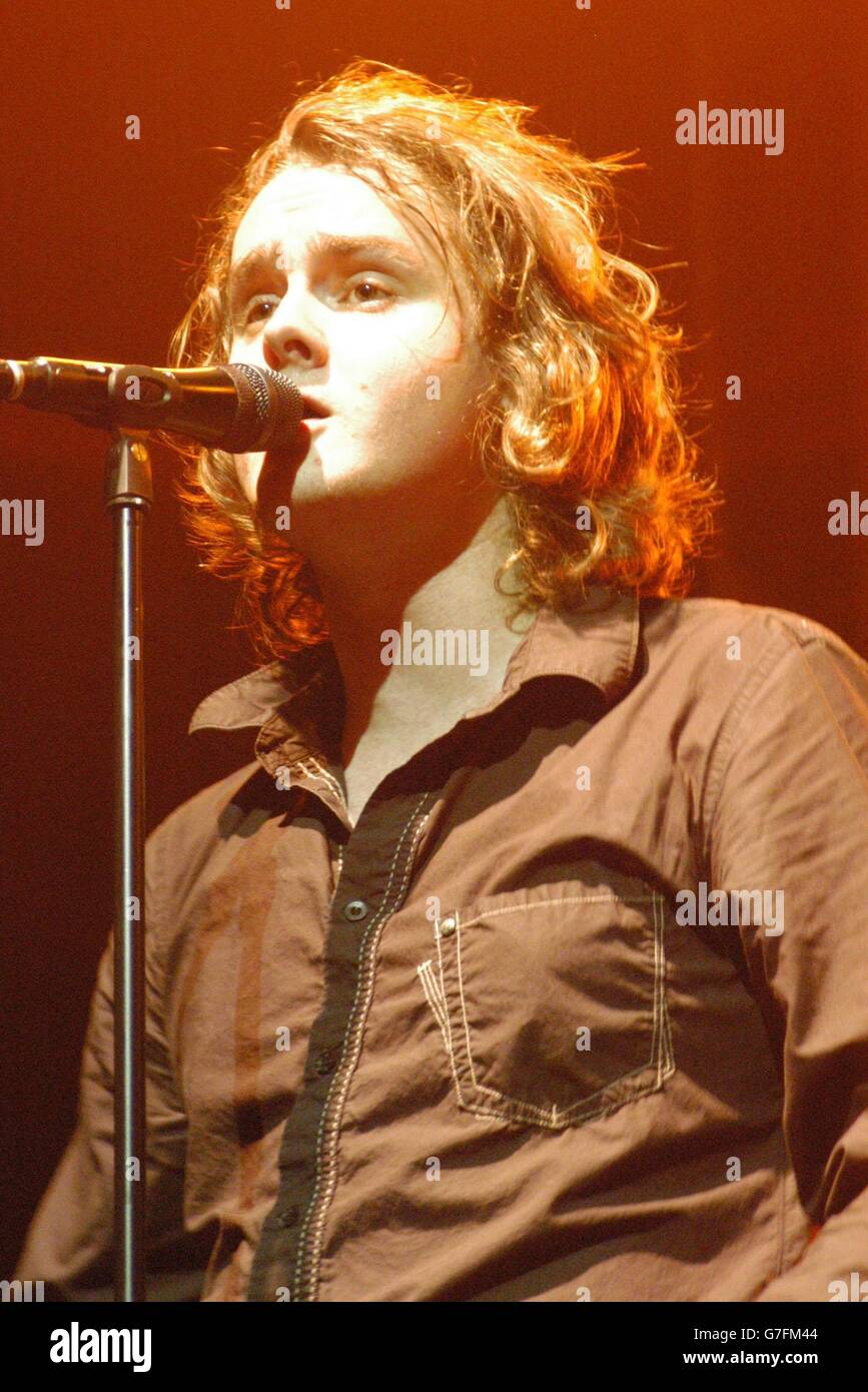 Keane lead singer tom chaplin performing on stage corn exchange hires