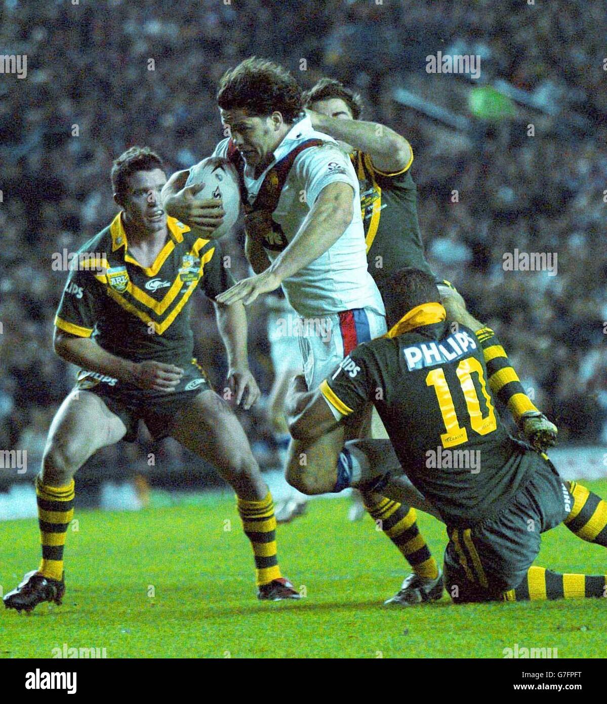 Great Britain Rugby League Captain Andy Farrell is dragged down by Peter Civoniceva of Australia in the Gillette Tri Nation Final in Leeds tonight. Stock Photo