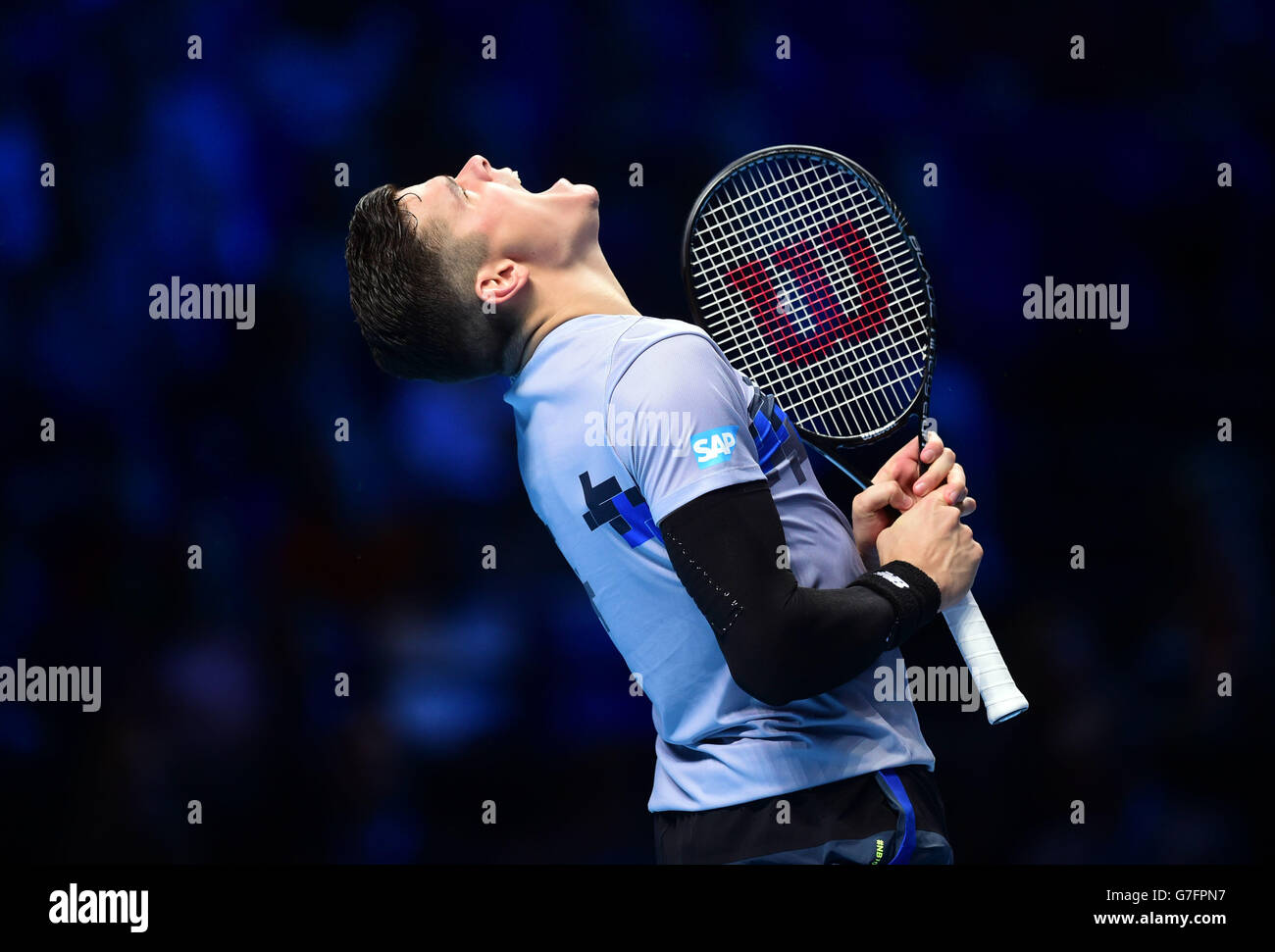 Canada's Milos Raonic screams during the Barclays ATP World Tour Finals at The O2 Arena, London. Stock Photo