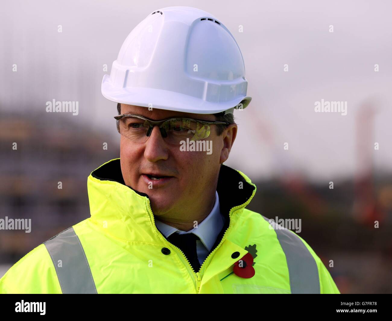 Prime Minister David Cameron during a tour of construction works underway at Cat Thorpe interchange at Swinford in Rugby Warwichshire. Stock Photo