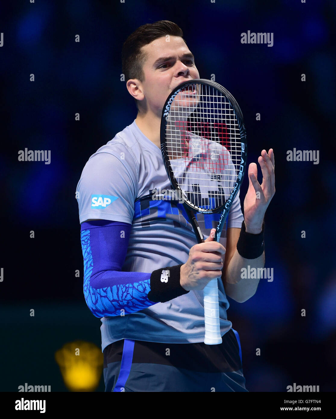 Canada's Milos Raonic during the Barclays ATP World Tour Finals at The O2 Arena, London. PRESS ASSOCIATION Photo. Picture date: Tuesday November 11, 2014. See PA story TENNIS London. Photo credit should read Adam Davy/PA Wire. Stock Photo