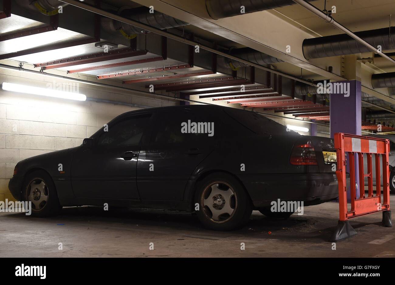 Dumped car racks up £9k parking fee Stock Photo Alamy