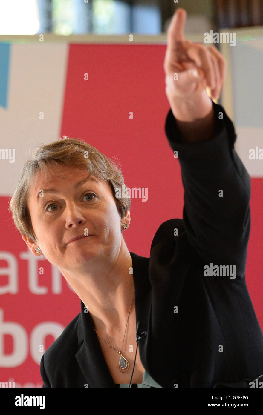 Shadow home secretary Yvette Cooper delivers a speech on immigration in central London where she said that Labour will seek to beef up its pitch to voters on immigration with a pledge to pay for 1,000 extra border guards by imposing a charge on visitors from the US and 55 other countries. Stock Photo